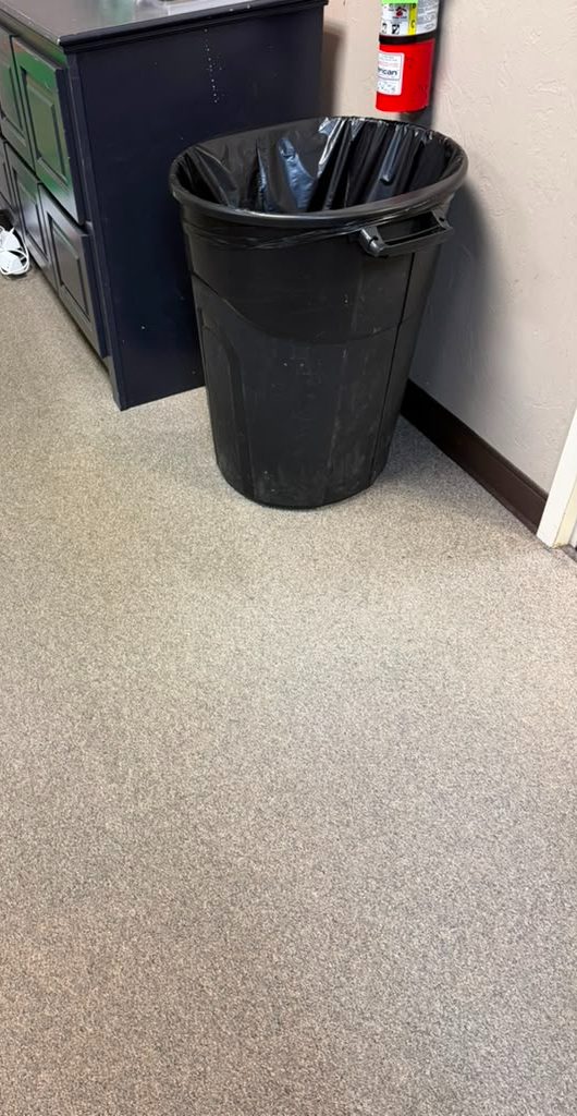 After — carpet cleaned around the trash station