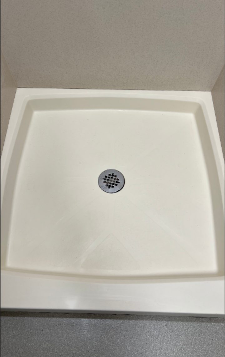 After — restroom shower pan cleaned
